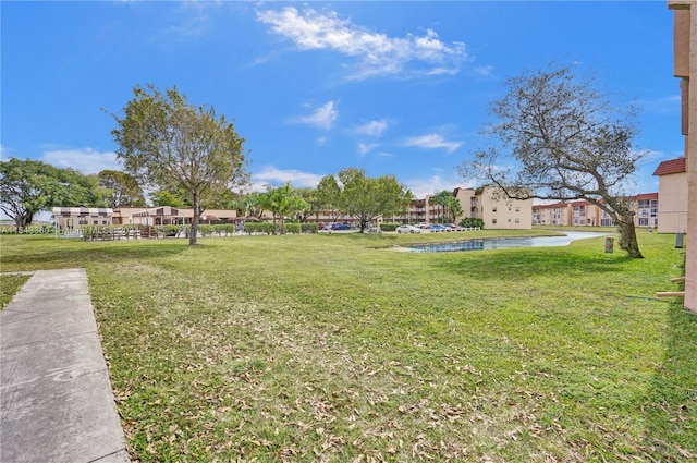 view of yard with a water view