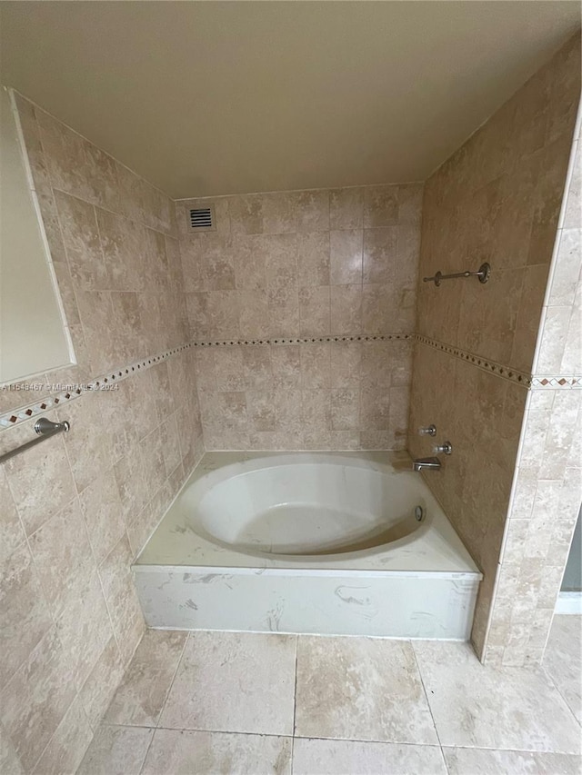 bathroom with tile floors