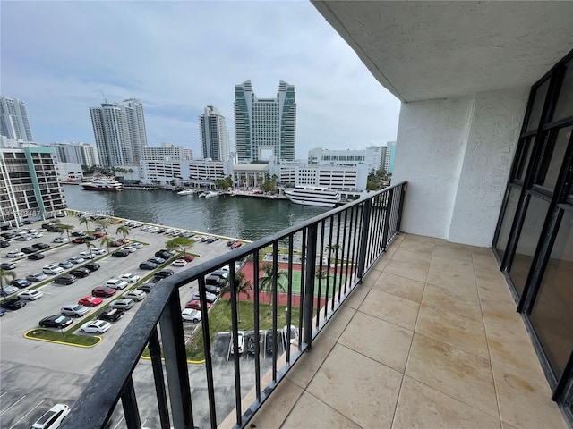 balcony featuring a water view