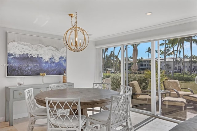 dining space with an inviting chandelier and crown molding