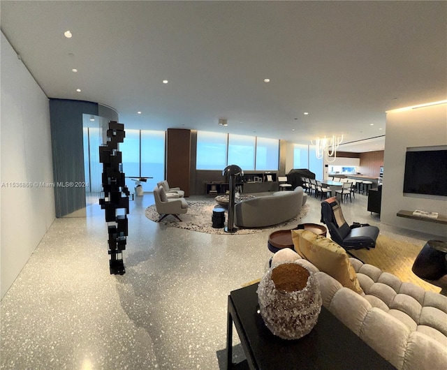 living room with floor to ceiling windows