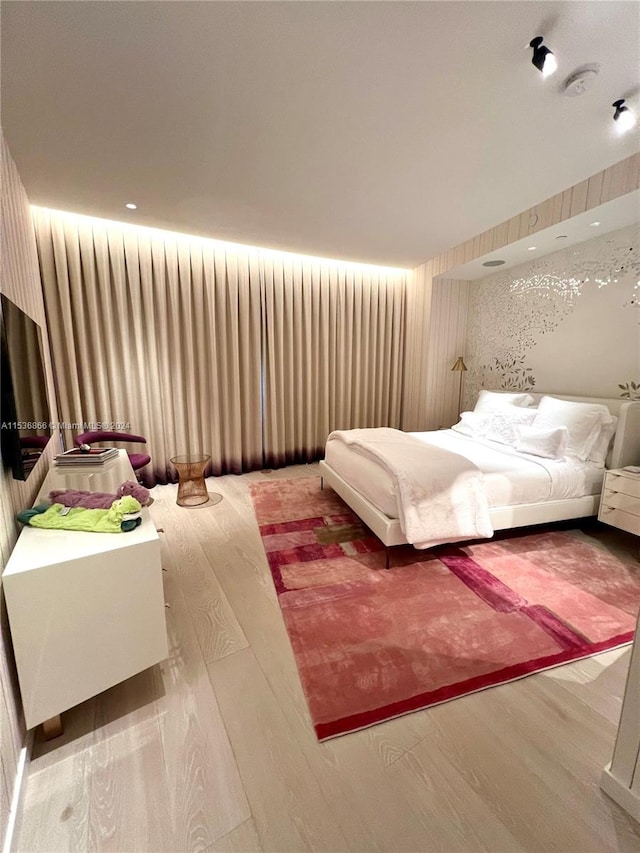 bedroom featuring light hardwood / wood-style flooring