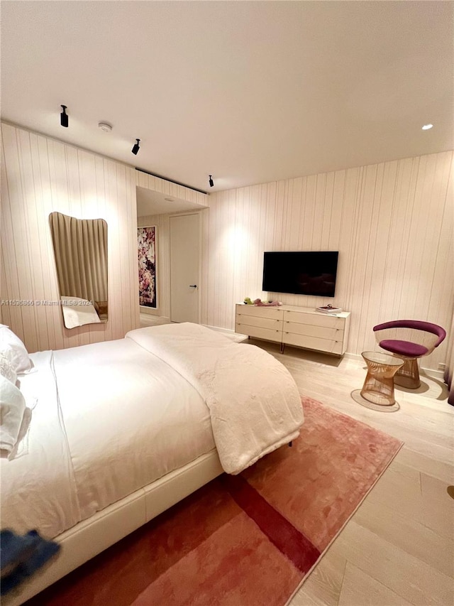 bedroom featuring hardwood / wood-style floors