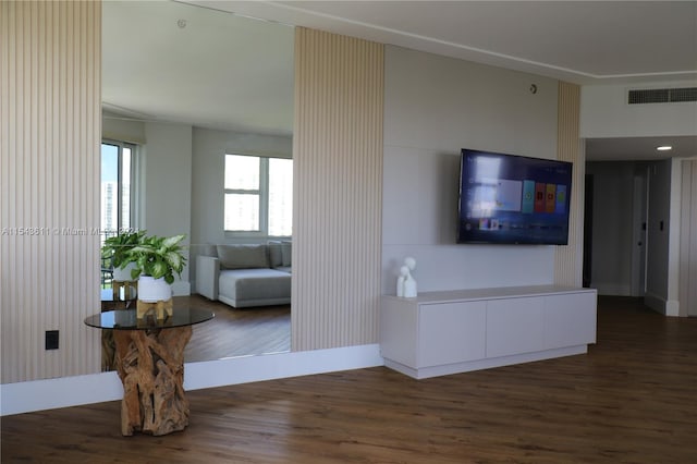 living room featuring dark hardwood / wood-style flooring