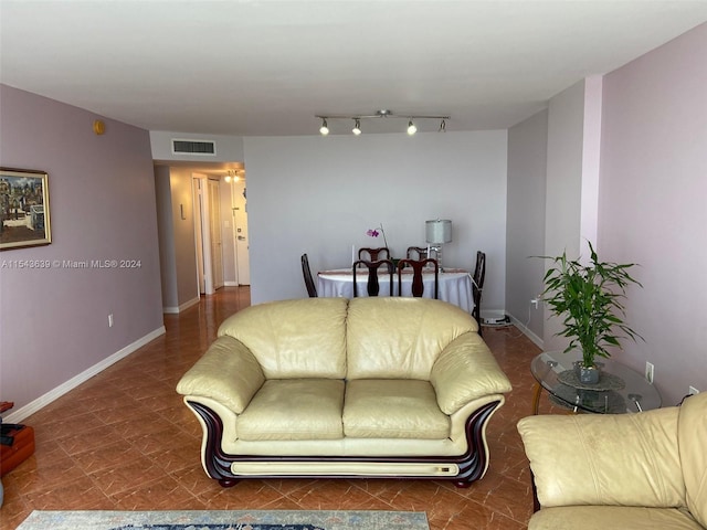 tiled living room with track lighting