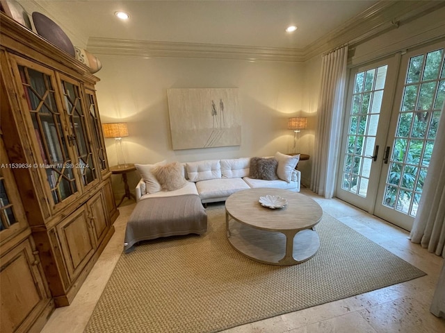 living area featuring ornamental molding and french doors