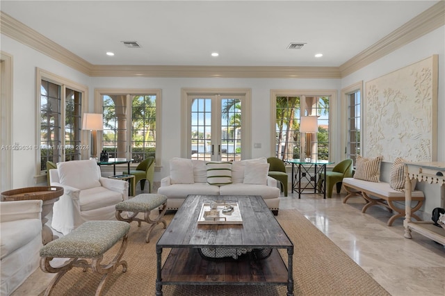 living room featuring crown molding, french doors, and a wealth of natural light