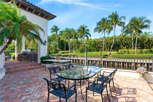 view of patio / terrace featuring a water view