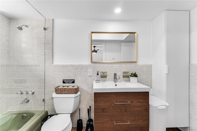 full bathroom featuring backsplash, tile walls, toilet, and vanity