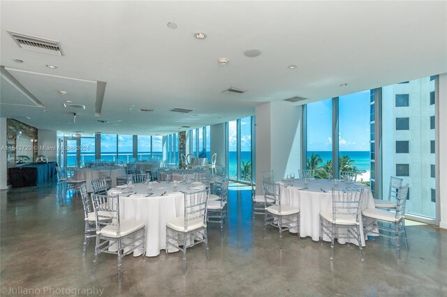 dining room with a water view