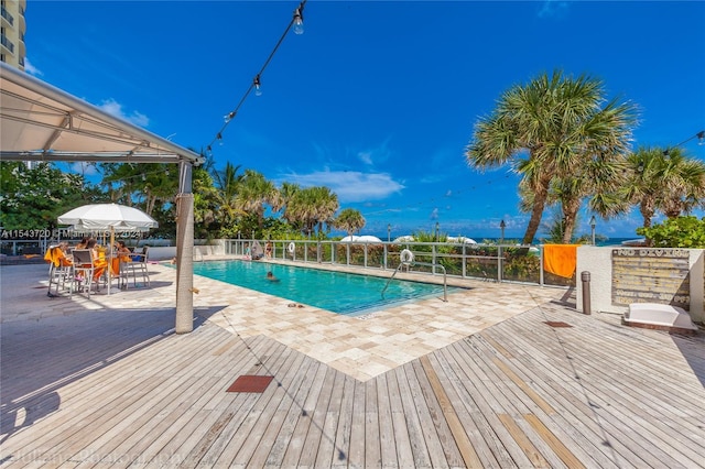 view of pool with a deck