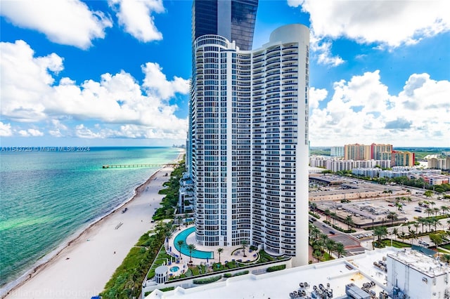 aerial view with a view of the beach and a water view