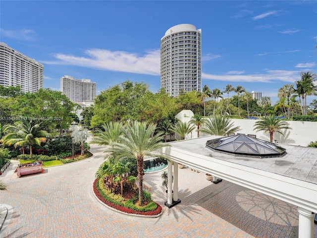 view of nearby features with a swimming pool and a patio area