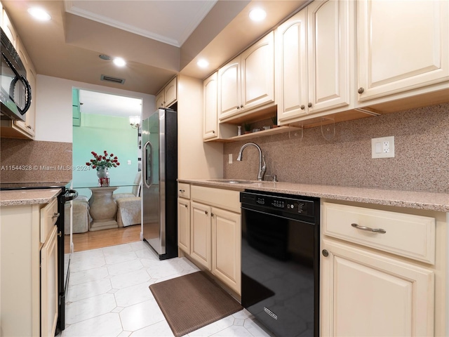 kitchen with sink, cream cabinets, decorative backsplash, black appliances, and ornamental molding