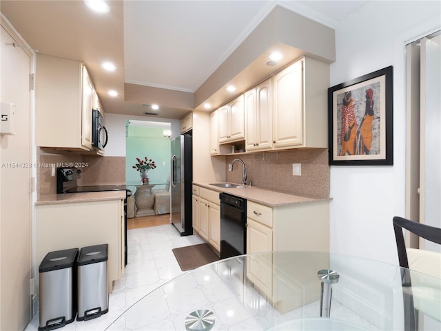 kitchen with black appliances, decorative backsplash, ornamental molding, and sink