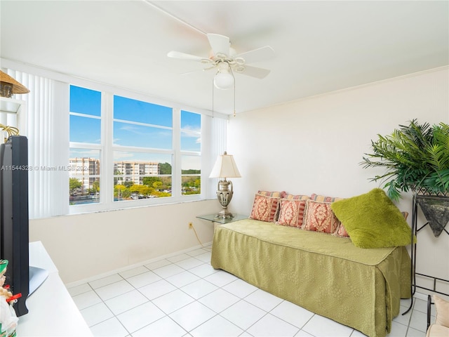 bedroom featuring ceiling fan and light tile patterned flooring