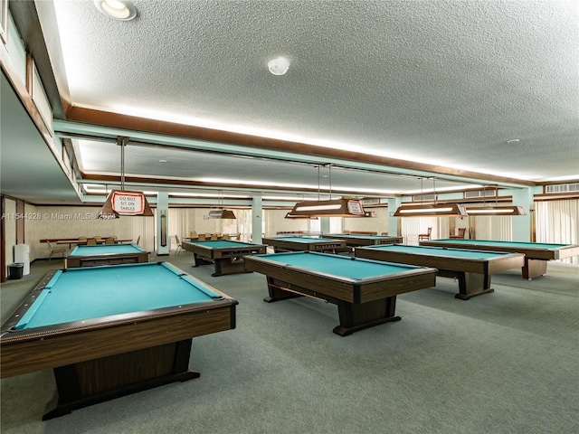 game room featuring carpet flooring, a textured ceiling, and pool table