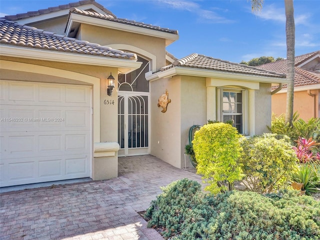 entrance to property with a garage