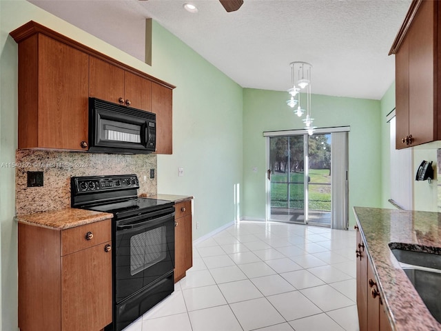 kitchen featuring pendant lighting, backsplash, black appliances, vaulted ceiling, and a textured ceiling