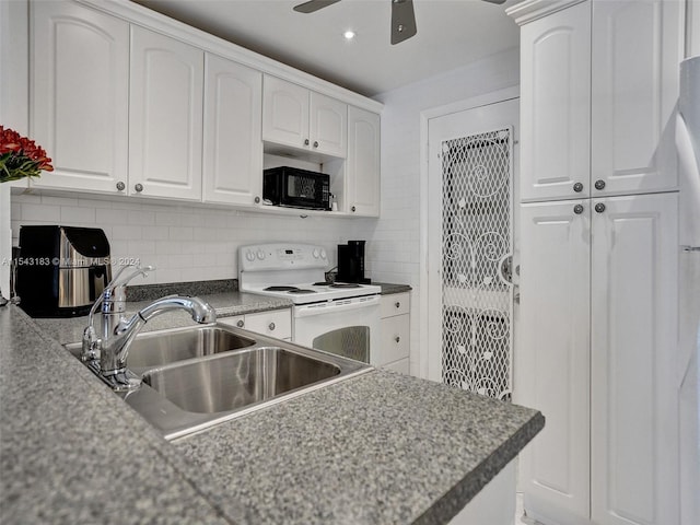 kitchen featuring white cabinets, white electric range, ceiling fan, and tasteful backsplash