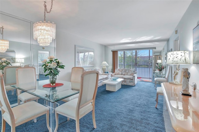 carpeted dining area featuring a chandelier