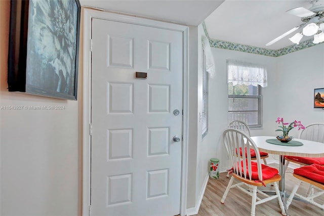 interior space with ceiling fan and light wood-type flooring