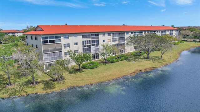 view of building exterior featuring a water view