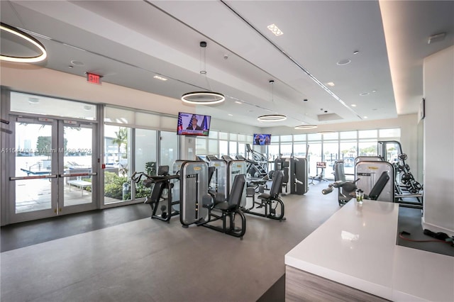 gym featuring french doors