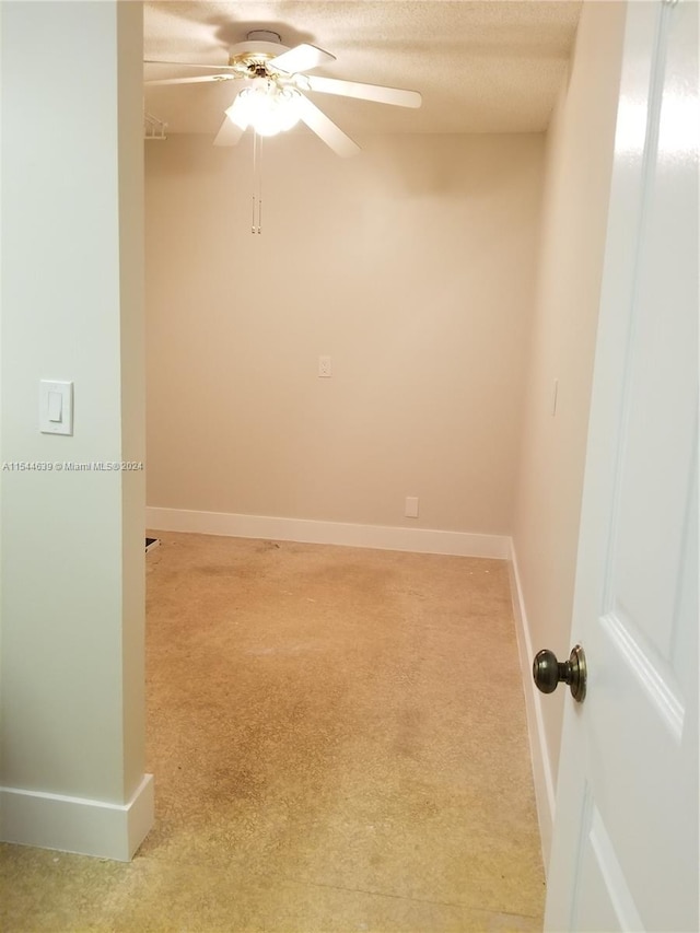 unfurnished room featuring ceiling fan