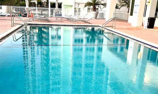 view of pool featuring a patio area