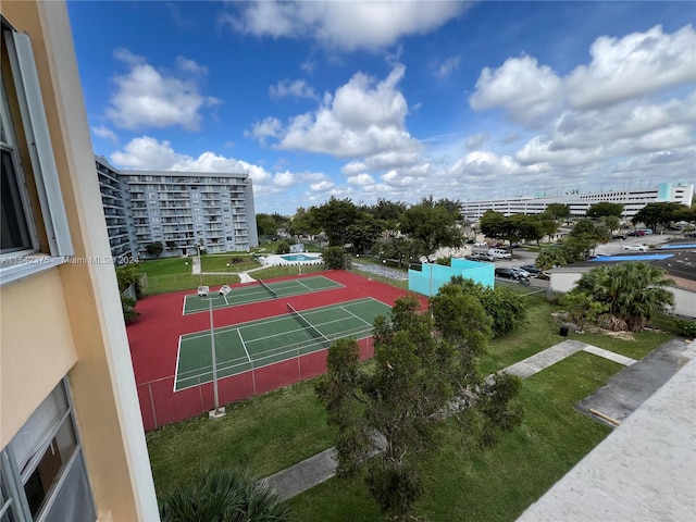 exterior space with tennis court