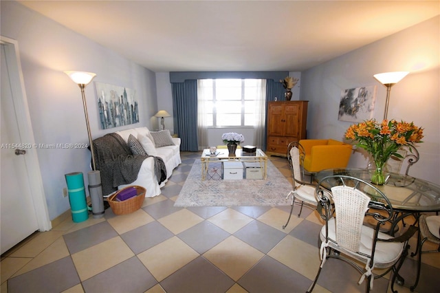 living room featuring light tile flooring