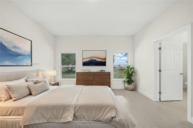 bedroom featuring light wood-type flooring