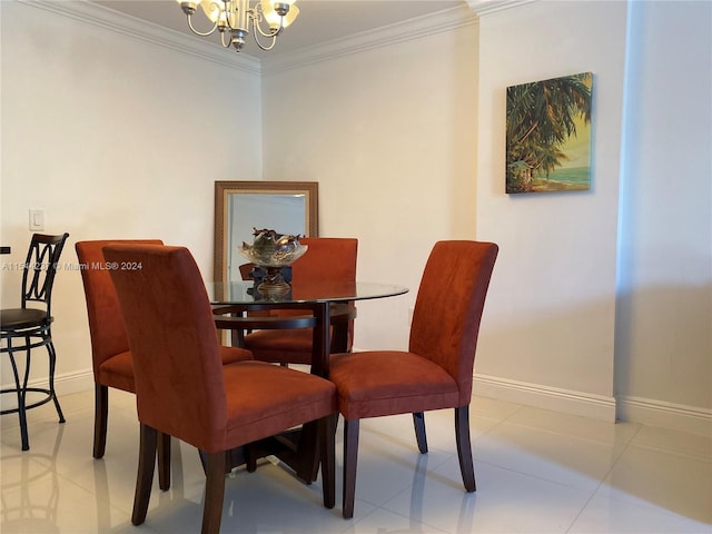 dining area featuring crown molding, a notable chandelier, and light tile patterned floors