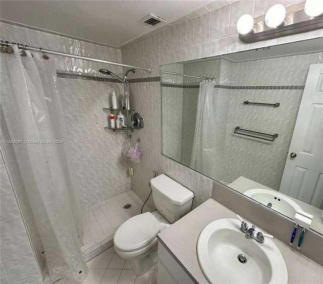 bathroom featuring vanity, tile walls, tile flooring, toilet, and a shower with shower curtain