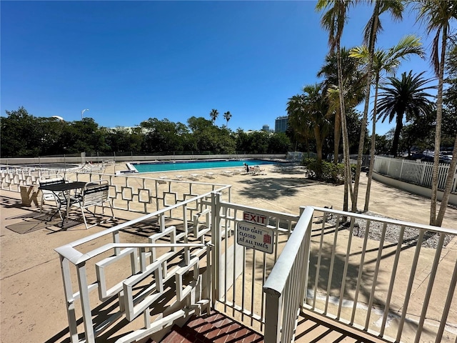 view of swimming pool featuring a patio