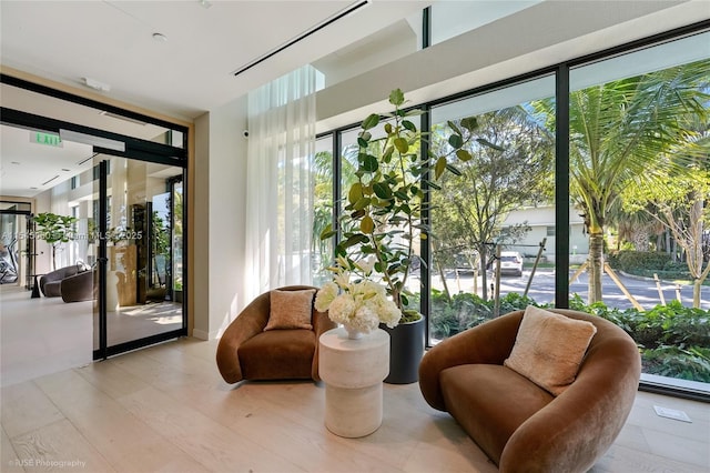 9901 W Bay Harbor Dr Unit 303, Bay Harbor Islands, FL 33154 - community lobby with a wall of windows