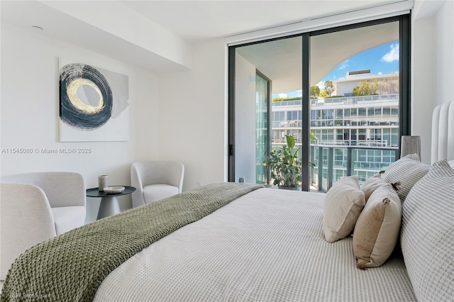9901 W Bay Harbor Dr Unit 303, Bay Harbor Islands, FL 33154 - bedroom with a wall of windows