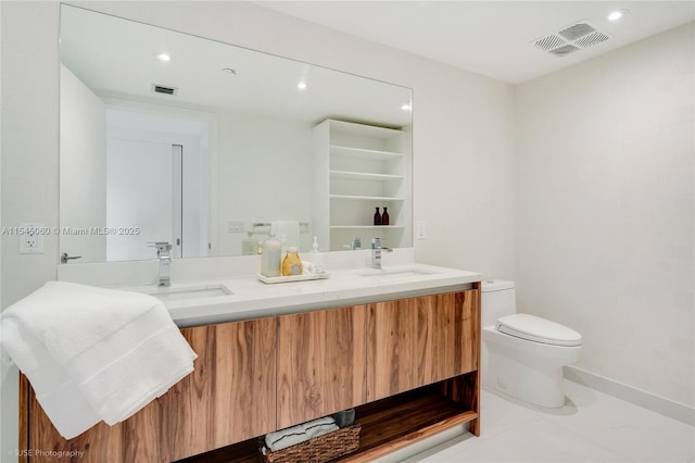 9901 W Bay Harbor Dr Unit 303, Bay Harbor Islands, FL 33154 - bathroom featuring double vanity and recessed lighting