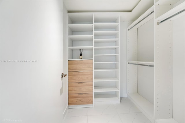 9901 W Bay Harbor Dr Unit 303, Bay Harbor Islands, FL 33154 - spacious closet with marble finish flooring