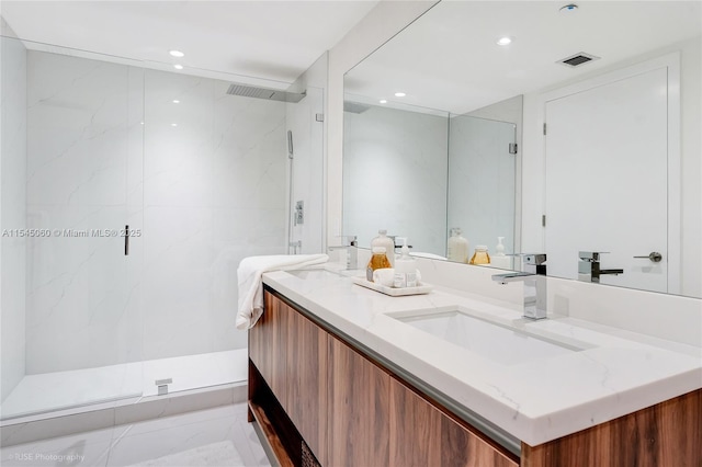 9901 W Bay Harbor Dr Unit 303, Bay Harbor Islands, FL 33154 - bathroom with double vanity, a marble finish shower, and recessed lighting