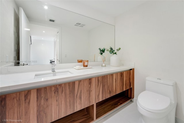 9901 W Bay Harbor Dr Unit 303, Bay Harbor Islands, FL 33154 - bathroom with vanity and toilet