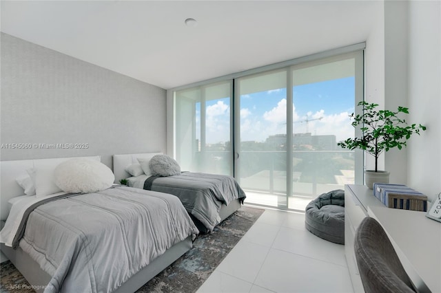 9901 W Bay Harbor Dr Unit 303, Bay Harbor Islands, FL 33154 - bedroom featuring access to outside, a wall of windows, and tile patterned floors