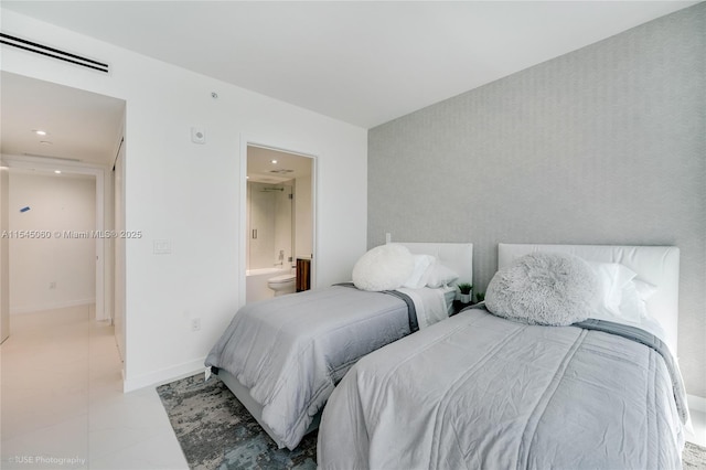 9901 W Bay Harbor Dr Unit 303, Bay Harbor Islands, FL 33154 - tiled bedroom with ensuite bath and recessed lighting