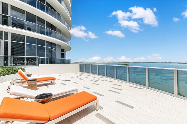 view of patio featuring a water view