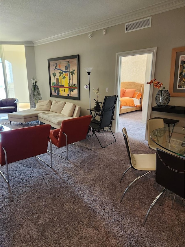 living room featuring ornamental molding and carpet