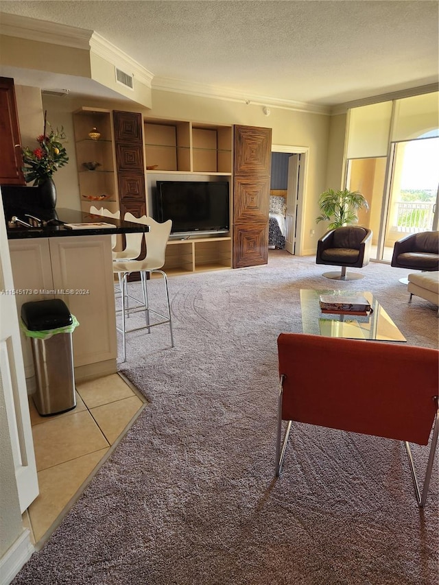 living room with light carpet, a textured ceiling, and crown molding