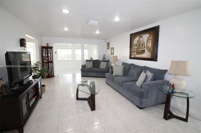 living room featuring light tile patterned flooring