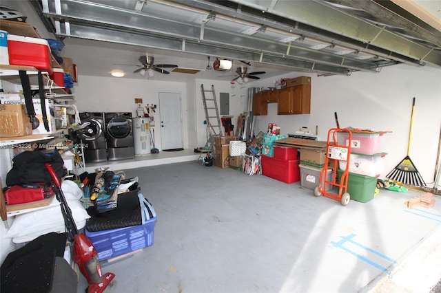 garage with ceiling fan, water heater, washing machine and clothes dryer, electric panel, and a garage door opener