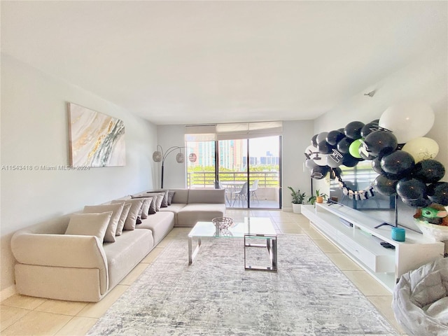 living room featuring light tile flooring